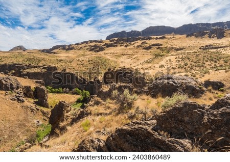 Jagged Rock Formations at Succor Creek State Natural Area, Oregon Royalty-Free Stock Photo #2403860489