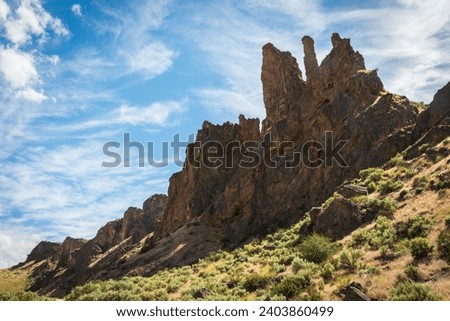 Jagged Rock Formations at Succor Creek State Natural Area, Oregon Royalty-Free Stock Photo #2403860499