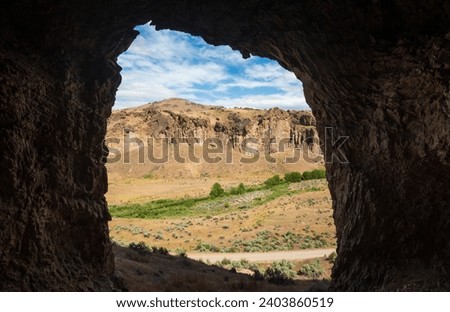 Massive Cave at Succor Creek State Natural Area in Oregon Royalty-Free Stock Photo #2403860519