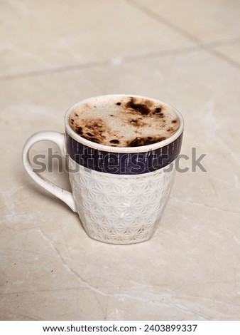 Hot coffee with cup mug with and without spoon  Nature yellow flower green screen background  wallpapers beautiful design HD  No logo  No human  happy new year 2024 