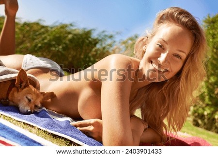 Woman, portrait and relaxing on grass and sunbathing with dog, vacation and travel to Hawaii. Female person, resting and happy on lawn and peace in garden, nature and wellness on holiday and animal