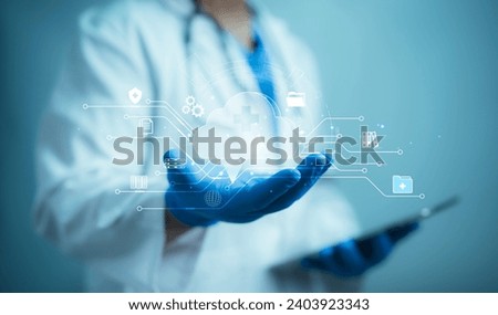 Medical worker hold cloud computing icon network. Cloud technology,Cloud data transfer and online data storage for business network confidential data of medical internet storage network.
