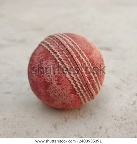 Test Match Cricket Ball Leather Hard Circle Stitch Closeup Picture On Gray Background