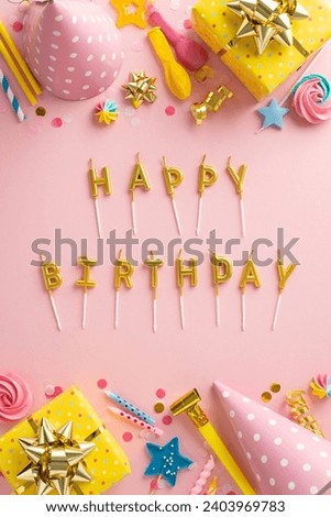 Lovely birthday party composition. Top-view vertical image capturing sweet merengue, wrapped presents, celebratory hats, balloons, confetti, "Happy Birthday" letter candles on pastel pink backdrop