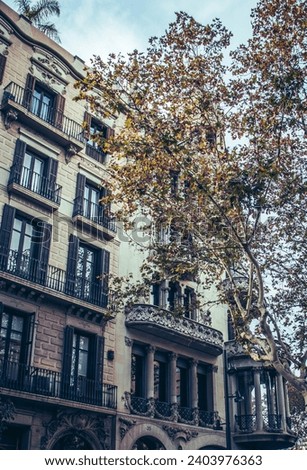 Old apartment building with balcony, Barcelona, Catalonia. Beautiful urban scenery photography. Street scene. High quality picture for wallpaper, article