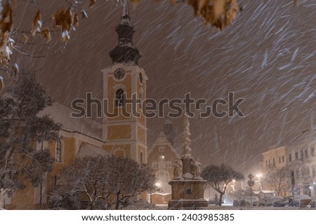 The town of Hodonín in the middle of winter. Advent time in Hodonín. Snow-covered square.