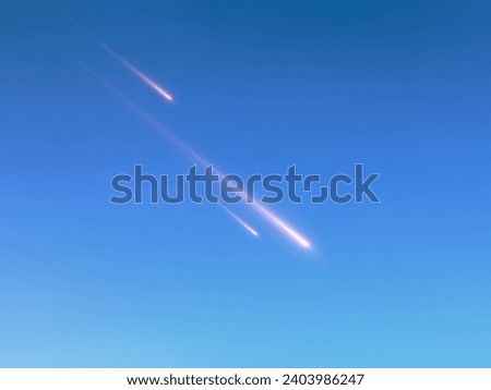 Meteors burn up in the daytime sky. Fireballs in daylight. Fall of bright meteorites on a blue background.