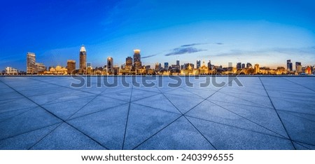 City Square floor and Shanghai skyline with modern buildings at night, China. Famous Bund architectural scenery in Shanghai. Panoramic view.