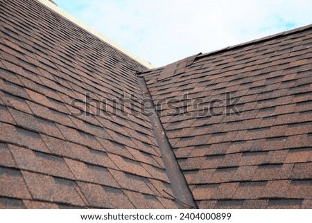 Asphalt shingles roofing construction, repair, installation, replace, renovation. Problem Areas for House Asphalt Shingles Corner Roofing Construction Waterproofing. Royalty-Free Stock Photo #2404000899