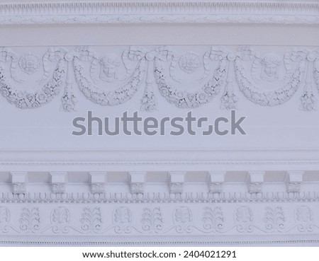 Bas-relief on the wall. Antique stucco