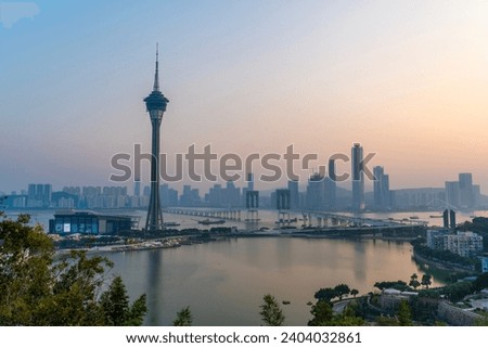 Macau Sunset view city skyline and Macau Tower Convention and Entertainment Center at Macao