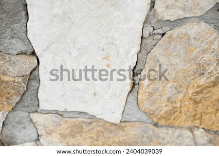 Grey beige stone concrete cracked with detail and lines wall creative pattern design abstract texture plain abstract background