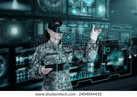 Military Think Tank, AI technology in the army. Warfare analytic operator checking coordination of the military team. Military commander with a digital device with vr glasses operating troops. Royalty-Free Stock Photo #2404044435