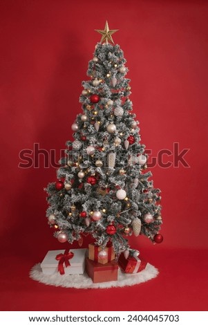 Christmas tree on the red background - Full Body