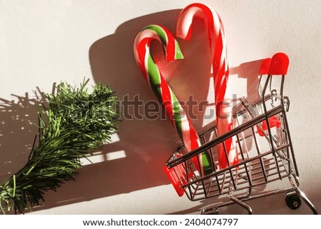 Candy canes in shopping trolley