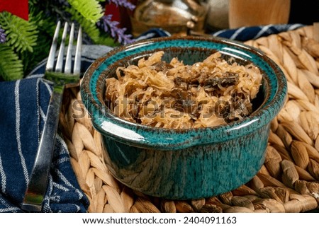 Lenten sauerkraut with mushrooms. A festive delicacy. Shallow depth of field.