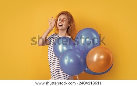 party girl with balloon in sunglasses. girl smile hold party balloons in studio. girl with balloon