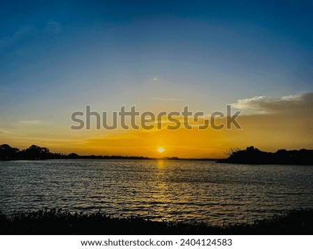 Beautiful and romantic sunset at a lake