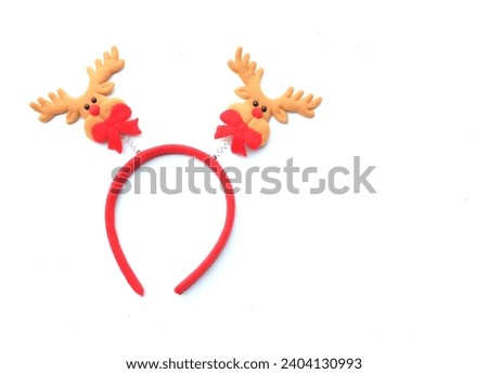 cute Christmas headbands with christmas reindeer horns isolate on a white backdrop. concept of joyful Christmas party,New year is coming soon, festive season decoration with Christmas elements