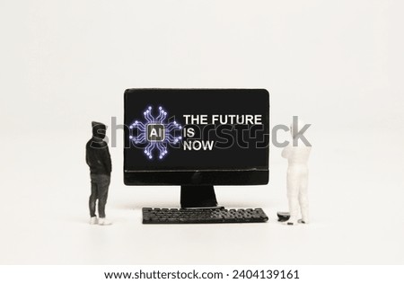 A picture of AI Chip with The Future Is Now word on screen monitor with men miniature insight.