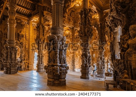 Indoor The Sanctuary of Truth wooden temple in Pattaya Thailand, a gigantic wooden construction located at the cape of Naklua Pattaya City Chonburi Thailand Royalty-Free Stock Photo #2404177371