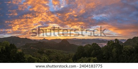 sky and background concept Wide panoramic view of the sky at sunset and sunrise ,mae hong son province, Thailand. 
