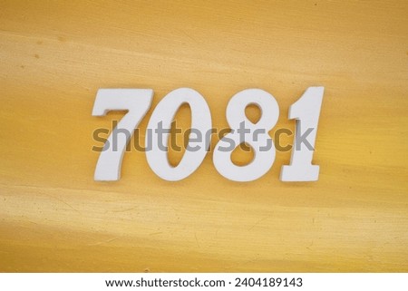 The golden yellow painted wood panel for the background, number 7081, is made from white painted wood.