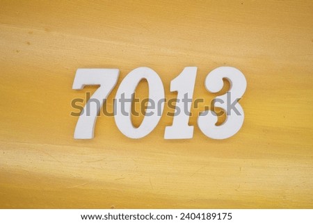 The golden yellow painted wood panel for the background, number 7013, is made from white painted wood.