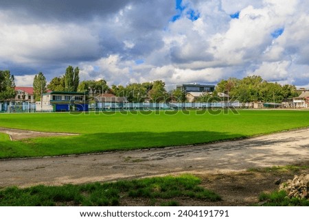 Old stadium for physical education. Background with selective focus and copy space for text Royalty-Free Stock Photo #2404191791