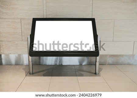 Information kiosk blank template mockup in front of clean tiled wall. Mock up for street map or shopping mall retail floor directory. Directional sign or locality map.