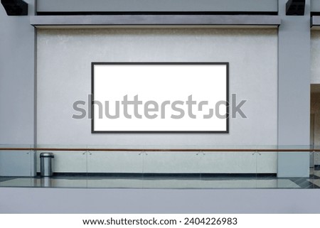 Horizontal advertising blank mockup on light textured wall. OOH out of home framed poster template. Modern shopping mall interior.