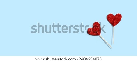 Valentines day or Appreciation theme with red glitter heart picks Royalty-Free Stock Photo #2404234875