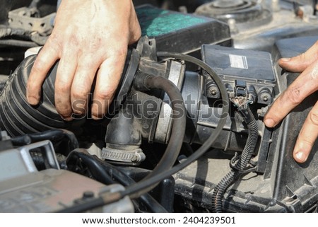 Disassembly of the engine air supply system on the vehicle
