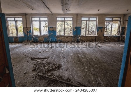School in Illinci abandoned village in Chernobyl Exclusion Zone Royalty-Free Stock Photo #2404285397