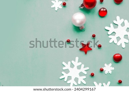 Merry Christmas and Happy New Year. Flat lay photo with Christmas decorations on blue background. Xmas greeting card, banner. Copy space for the text