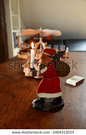 Nikolaus Santa claus figure with candle burning antique. High quality photo