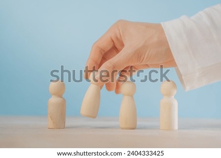 leadership human resources motivation to success, wood doll conception, success leader in performance opportunity  recruitment in vision of business team, growth by knowledge to professional position Royalty-Free Stock Photo #2404333425