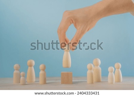 leadership human resources motivation to success, wood doll conception, success leader in performance opportunity  recruitment in vision of business team, growth by knowledge to professional position Royalty-Free Stock Photo #2404333431