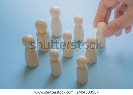 leadership human resources motivation to success, wood doll conception, success leader in performance opportunity  recruitment in vision of business team, growth by knowledge to professional position Royalty-Free Stock Photo #2404333587