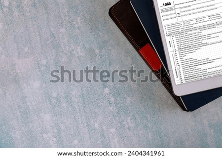American tax period US Return of Partnership Income Tax Form 1065 with online form filling Royalty-Free Stock Photo #2404341961