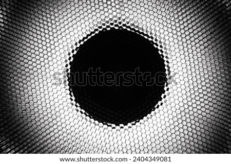 Beauty dish light modifier with honeycomb grid - detail Royalty-Free Stock Photo #2404349081