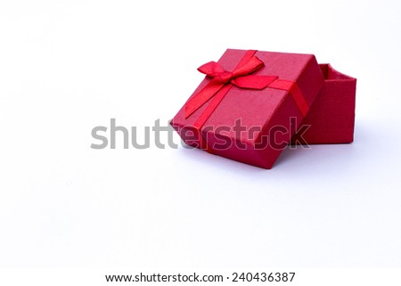 Red gift box on a white background.