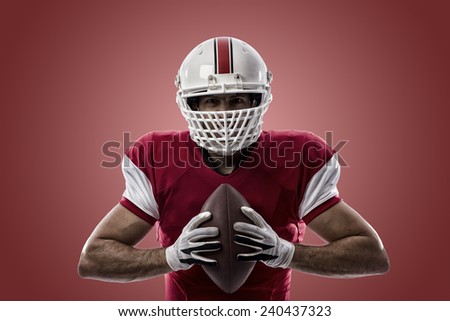 Football Player with a red uniform on a red background.