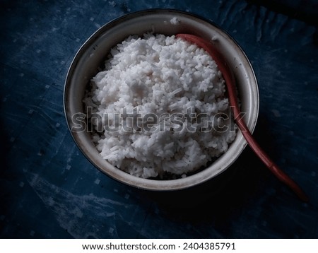 A photo of cold white rice in a bowl. 