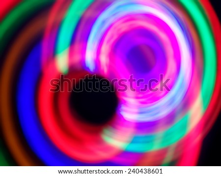 Colorful abstract whirling lights background for holidays!