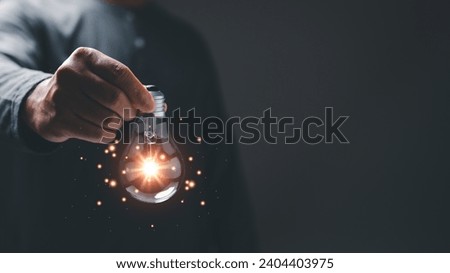 Idea, creativity concept. Business thrives on the power of creativity, where idea bulb illuminates innovative concepts, fostering a dynamic atmosphere of innovation and energy in pursuit of success. Royalty-Free Stock Photo #2404403975