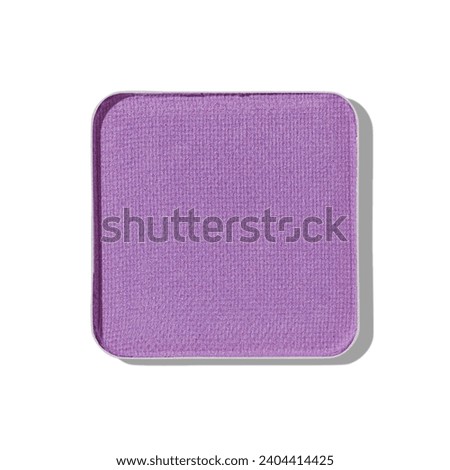 Top view eye shadow violet swatch, object isolated on white background with shadow, sparkling eyeshadow, colored matte powder for festive makeup, square shape metal pack, beauty cosmetics texture