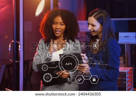 API Application Programming Interface, woman using laptop, tablet and smartphone with virtual screen API icon Software development tool, modern technology and networking