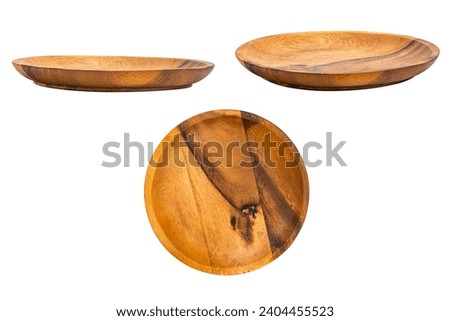 Group of empty round wooden plate isolated on white background with clipping path.
