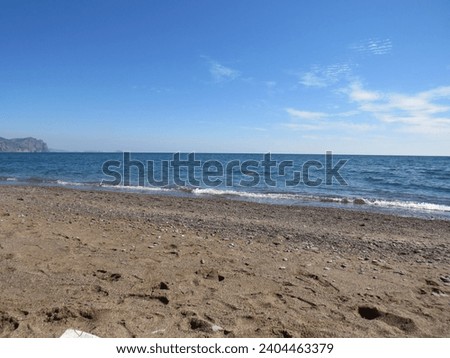 sea view and waves on a sunny summer day